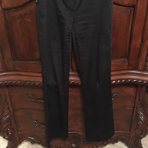 Straight leg trousers. Falls at natural waist